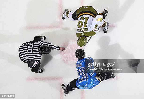 Garett Hunter of the London Knights takes a faceoff against Cody Hodgson of the Brampton Battalion in a game on February 6, 2010 at the John Labatt...