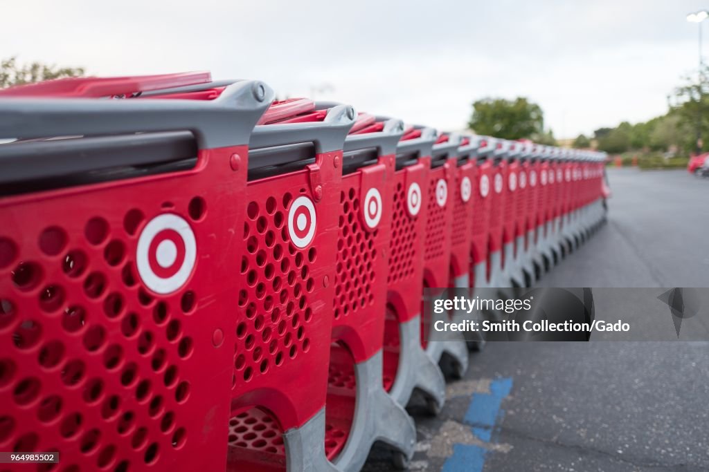 Target Sampling Cart Selective-focus image of a long row of red Target shopping cars in ...