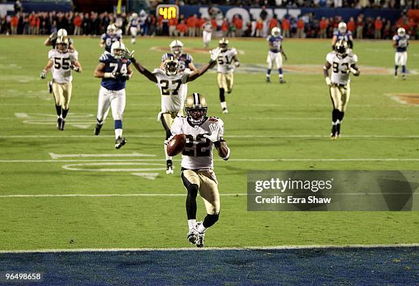 Tracy Porter of the New Orleans Saints returns a interception for touchdown against of the Indianapolis Colts during Super Bowl XLIV on February 7,...