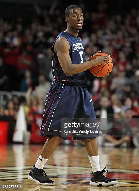 Kemba Walker of the Connecticut Huskies dribbles during the Big East Conference game against the Louisville Cardinals on February 1, 2010 at Freedom...