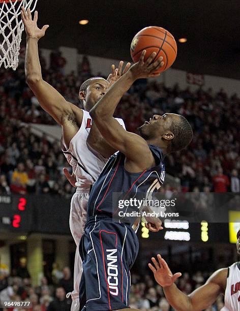 Kemba Walker of the Connecticut Huskies shoots during the Big East Conference game against the Louisville Cardinals on February 1, 2010 at Freedom...