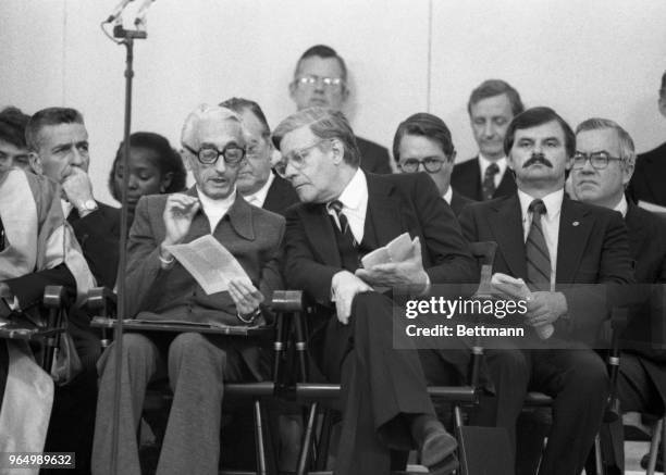 French marine explorer, Jacques-Yves Cousteau, and West German Chancellor Helmut Schmidt discuss the day's program at Harvard University's 328th...