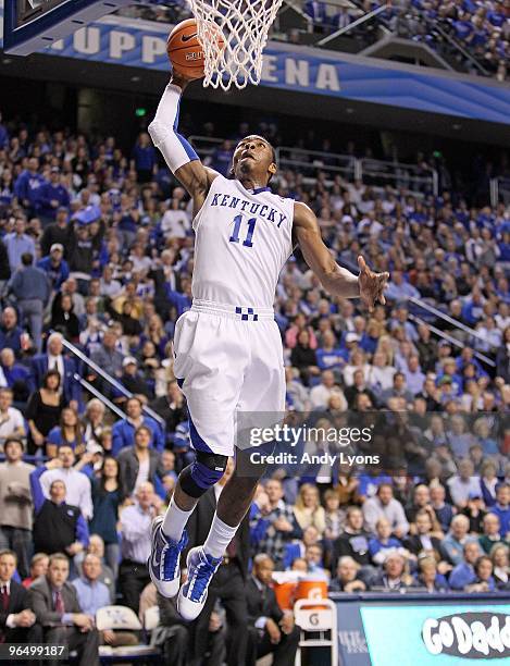 John Wall of the Kentucky Wildcats dunks the ball during the SEC game against the Ole Miss Rebels on February 2, 2010 at Rupp Arena in Lexington,...