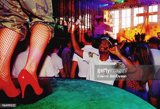 Dancers perform during the opening night of the season for Manumission, at Privilege nightclub in June 2001, in Ibiza.