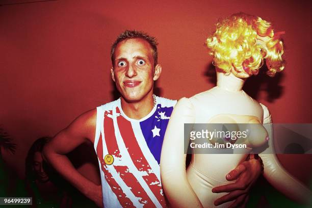 Clubbers enjoy the atmosphere during the after party of the opening night of the season for Manumission, on the terrace at Space in June 2001, in...