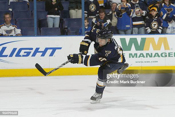 Andy McDonald of the St. Louis Blues shoots the puck during warm ups before the game against the Chicago Blackhawks on February 6, 2010 at Scottrade...