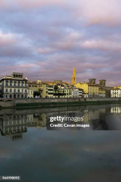 scuola del cuoio by arno river against cloudy sky during sunset in city - cuoio stock pictures, royalty-free photos & images