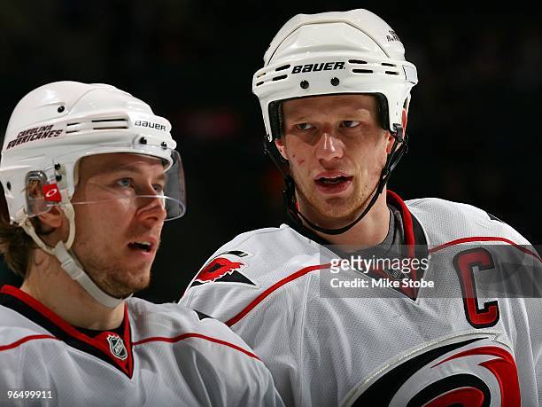 Eric Staal and Jussi Jokinen of the Carolina Hurricanes skates against the New York Islanders on January 6, 2010 at Nassau Coliseum in Uniondale, New...
