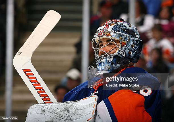 Goaltender Rick DiPietro of the New York Islanders skates against the Carolina Hurricanes on January 6, 2010 at Nassau Coliseum in Uniondale, New...