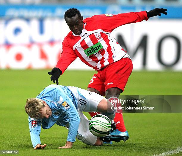 Sascha Roesler of Muenchen battles for the ball with Momar N'Diaye of Ahlen during the Second Bundesliga match between 1860 Muenchen and Rot Weiss...