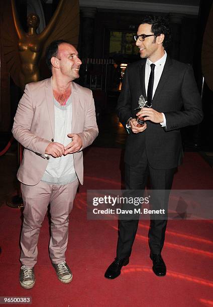 Sacha Baron Cohen with The Peter Sellers Award For Comedy with Dan Mazer attend the London Evening Standard British Film Awards 2010, at The London...