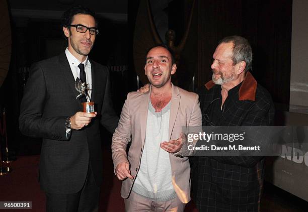 Sacha Baron Cohen with The Peter Sellers Award For Comedy with Dan Mazer and Terry Gilliam attend the London Evening Standard British Film Awards...