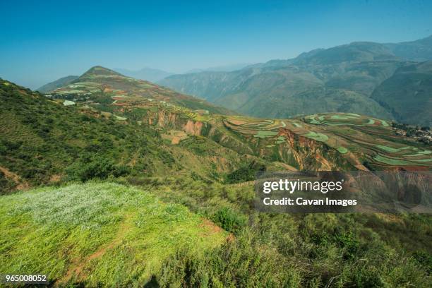 high angle scenic view of mountains against sky - 東城 ストックフォトと画像