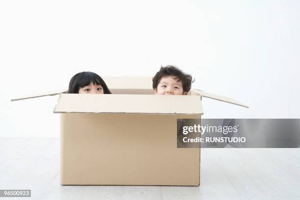 Hiding In Box 810 Kid Hiding In Box Stock Photos, High-Res Pictures, and Images ...