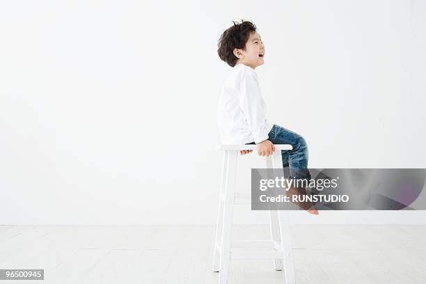 child with family - boy jeans stock pictures, royalty-free photos & images