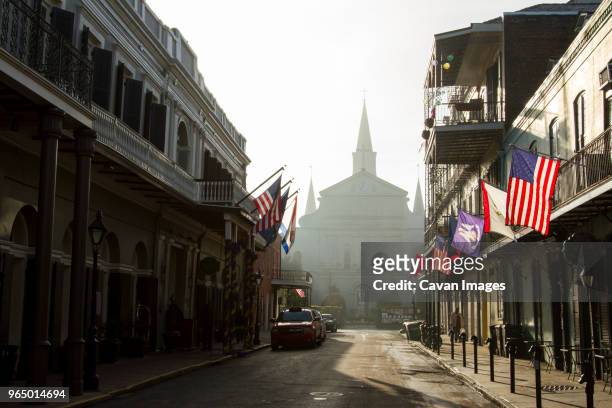 st. louis cathedral seen from street in foggy weather - new orleans french quarter photos et images de collection