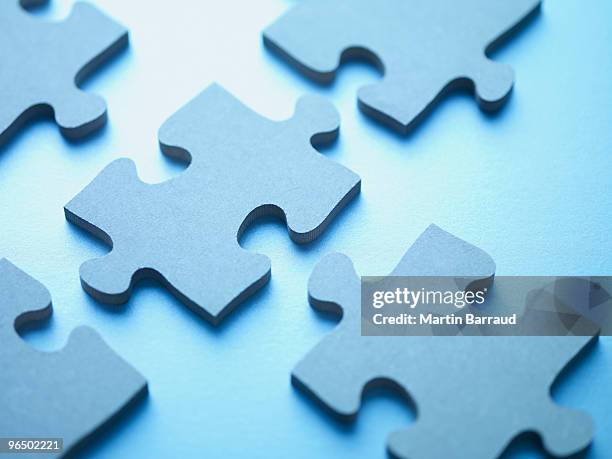 jigsaw puzzle pieces - jigsaw puzzle stock pictures, royalty-free photos & images