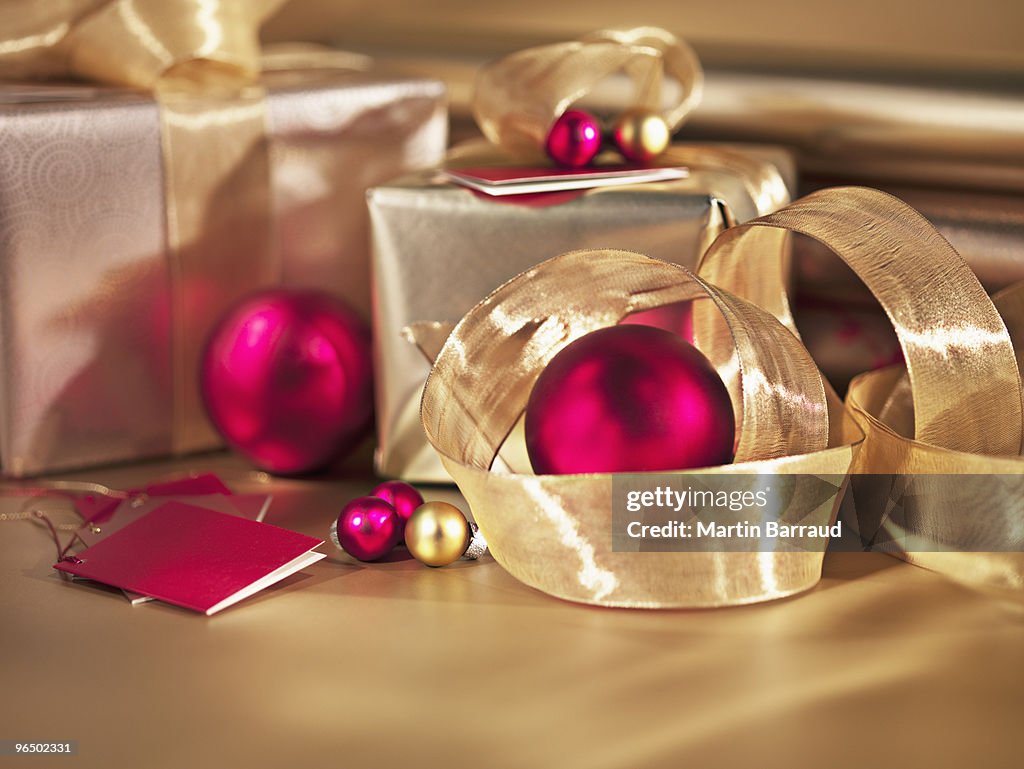 Christmas ornaments, ribbon and gifts