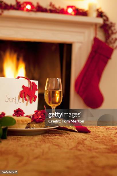 tartlet, wine and card for santa - stockings stock pictures, royalty-free photos & images