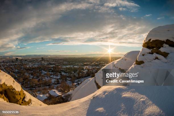 scenic view of townscape against cloudy sky during winter - billings bildbanksfoton och bilder