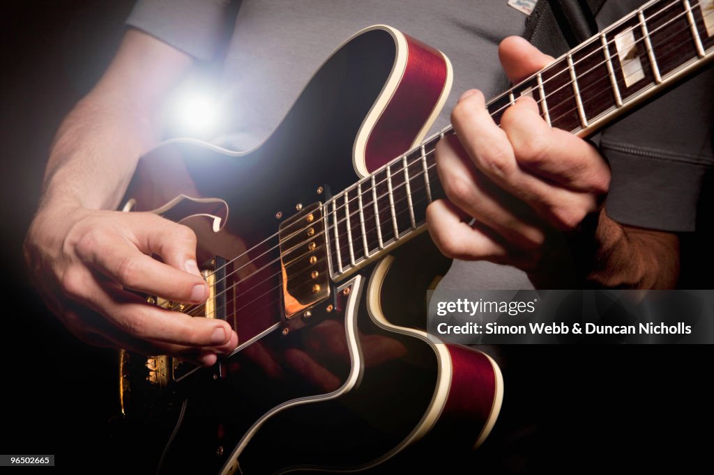 Man playing electric guitar