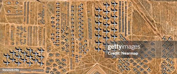 davis-monthan afb, tucson, az, largest aircraft boneyard in the world - airport aerial stock pictures, royalty-free photos & images