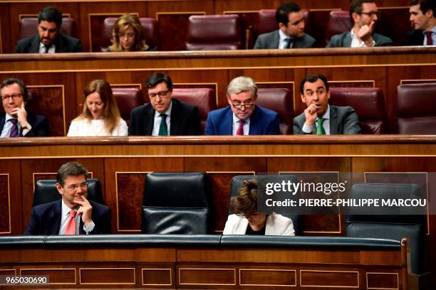 Spanish Minister of Justice Rafael Catala and Spanish deputy prime minister and Minister of the Presidency and of the Regional Administrations Soraya...