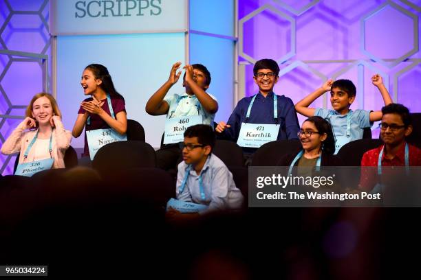 These spellers reacts as they find out they are finalists at the 91st Scripps National Spelling Bee is being held at the Gaylord National Resort &...