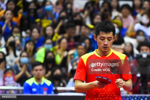 Zhang Jike of China reacts in the Men's Singles first round match against Tomokazu Harimoto of Japan during day two of the 2018 ITTF World Tour China...