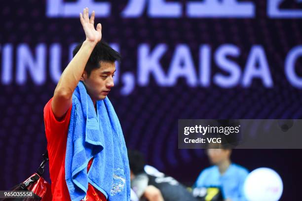 Zhang Jike of China reacts in the Men's Singles first round match against Tomokazu Harimoto of Japan during day two of the 2018 ITTF World Tour China...