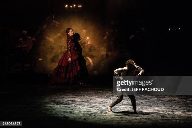 Artists perform on stage during the dress rehearsal of French choreographer Mourad Merzouki's last show "Folia", part of the Fourviere Festival in...