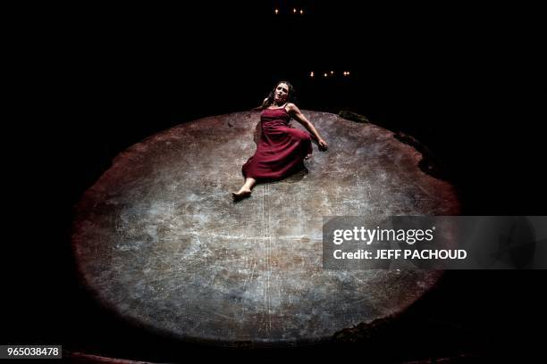 Artists perform on stage during the dress rehearsal of French choreographer Mourad Merzouki's last show "Folia", part of the Fourviere Festival in...