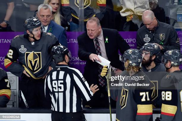 Head coach Gerard Gallant of the Vegas Golden Knights questions a call to linesman Jonny Murray during Game One of the 2018 NHL Stanley Cup Final...