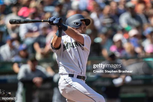 Chris Herrmann of the Seattle Mariners takes a swing during an at-bat in a game against the Minnesota Twins at Safeco Field on May 27, 2018 in...