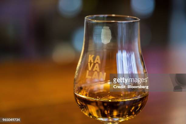 Glass of Kavalan whisky is arranged for a photograph at the Kavalan Single Malt Whisky distillery in Yilan County, Taiwan, on Thursday, Jan. 25,...