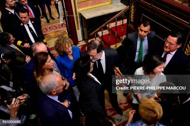 Spanish Prime Minister Mariano Rajoy arrives for a vote on a no-confidence motion at the Lower House of the Spanish Parliament in Madrid on June 01,...
