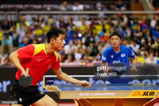 Zhang Jike of China competes in the Men's Singles first round match against Tomokazu Harimoto of Japan during day two of the 2018 ITTF World Tour...