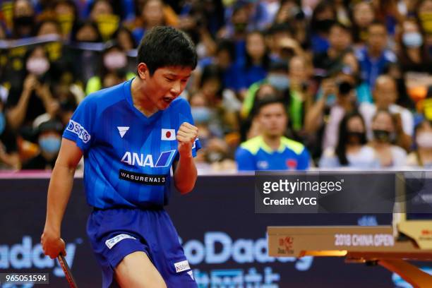 Tomokazu Harimoto of Japan celebrates a point in the Men's Singles first round match against Zhang Jike of China during day two of the 2018 ITTF...