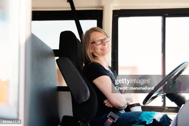 female bus driver - bus driver stock pictures, royalty-free photos & images