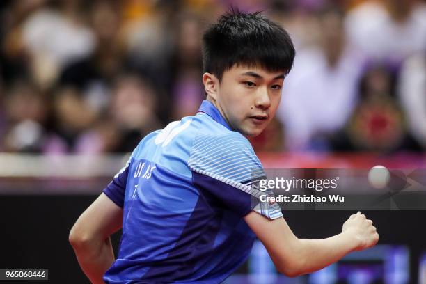 Lin Yun-Ju of Chinese Taipei in action at the men's singles match compete with Ma Long of China during the 2018 ITTF World Tour China Open on June 1,...