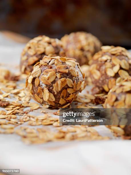 cocoa energy bites with toasted oats and almond butter - nut butter stock pictures, royalty-free photos & images