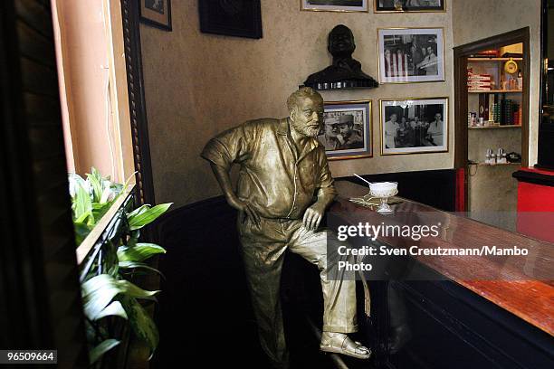 Life-size bronze statue of American writer Ernest "Papa" Hemingway, Literature Nobel Prize winner, leans on the bar at his regular spot at the...