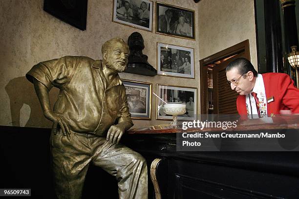 Life-size bronze statue of American writer Ernest "Papa" Hemingway, Literature Nobel Prize winner, leans on the bar at his regular spot at the...