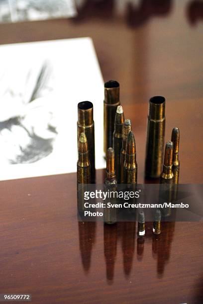 Cartridge cases stand on a desk the Ernest Hemingway house at the Finca Vigia, on November 11, 2002 in Havana, Cuba. The Hemingway Finca Vigia, home...