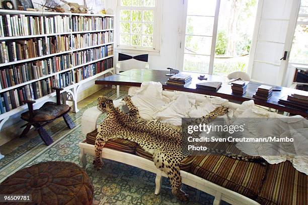 Hunting trophy, the skin of a Leopard, lies on the couch of a room in the Ernest Hemingway house at the Finca Vigia, on November 11, 2002 in Havana,...