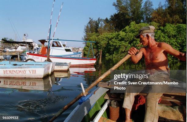 Cuban fisherman Felix rows as he returns from a fishing trip, in the little fishermen village Cojimar, on June 13 in Havana, Cuba. The American...