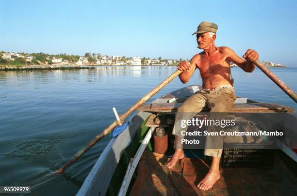 Cuban fisherman Felix rows as he leaves for a fishing trip, in the little fishermen village Cojimar, on June 13 in Havana, Cuba. The American writer...