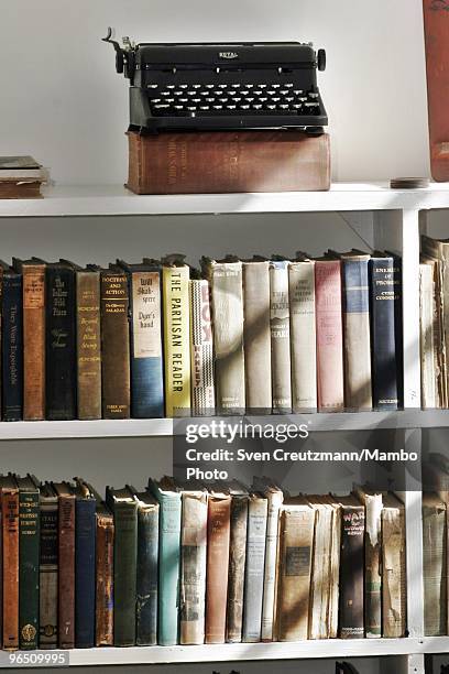 Typewriter and books in the living-room of Ernest Hemingway�s house at the Finca Vigia, on January 6, 2007 in Havana, Cuba. The Hemingway Finca...