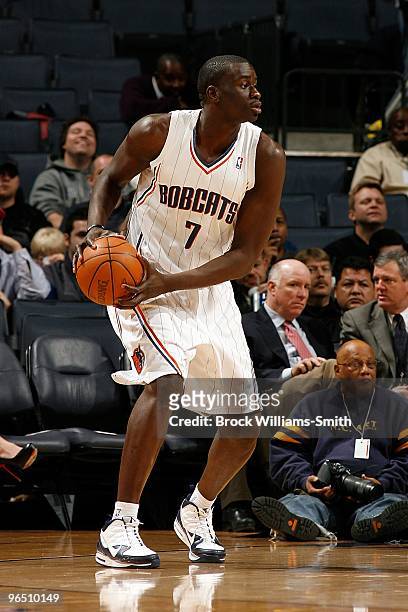 DeSagana Diop of the Charlotte Bobcats moves the ball to the basket during the game against the Houston Rockets on January 12, 2010 at Time Warner...