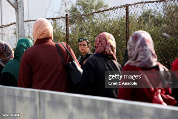 Palestinian worshippers, mostly from women wait in a queue to move for passing through the checkpoint from Bethlehem into Jerusalem after Israeli...